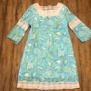 Lilly Pulitzer size medium dress. Shell print. Cotton lining, edged in lace.